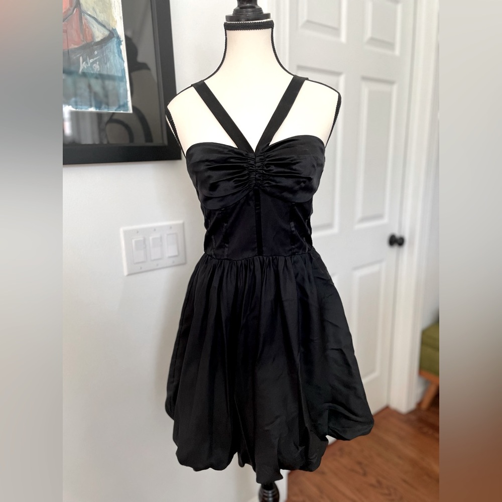 Flattering Bebe little black dress!